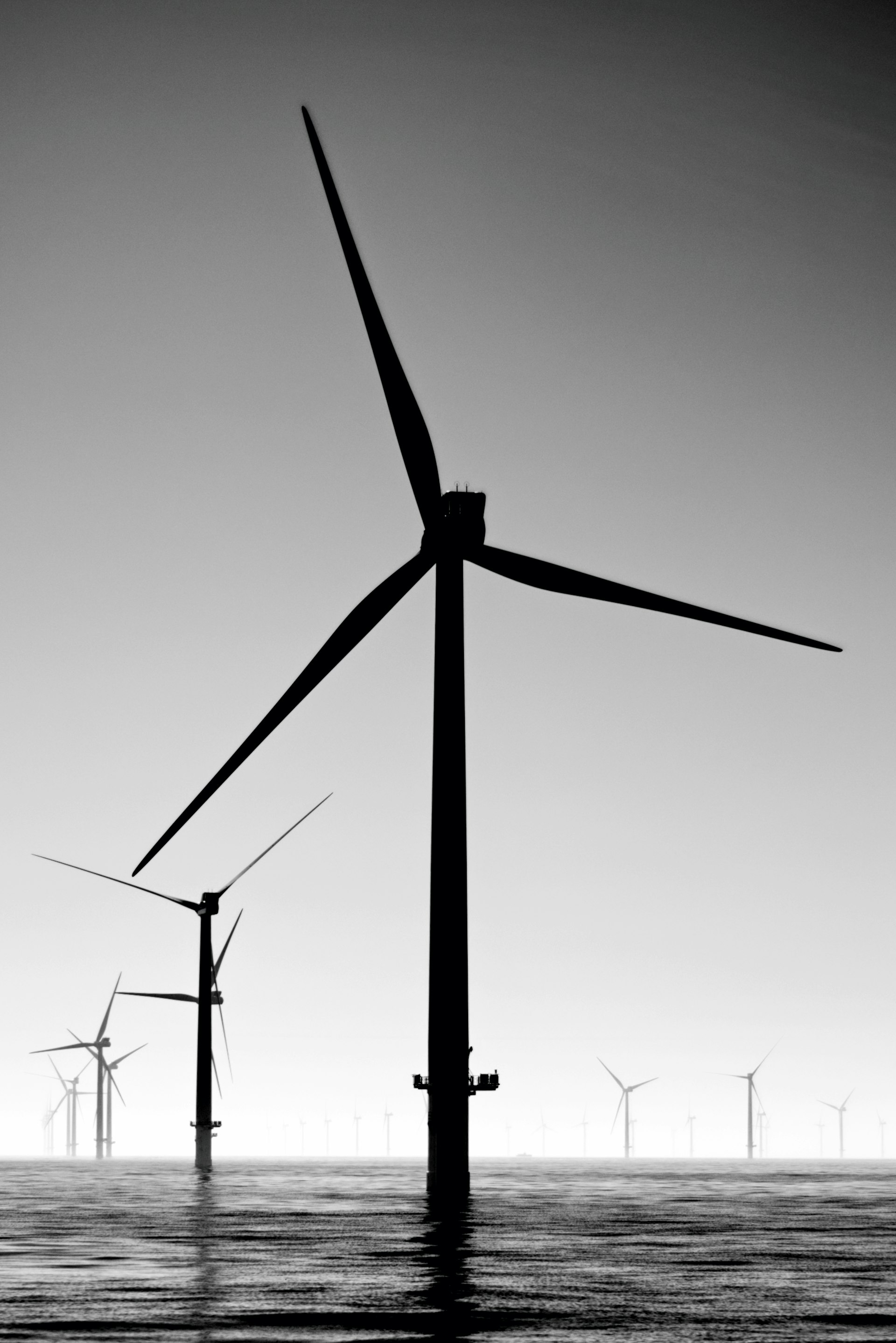 Offshore wind turbines under dramatic sky